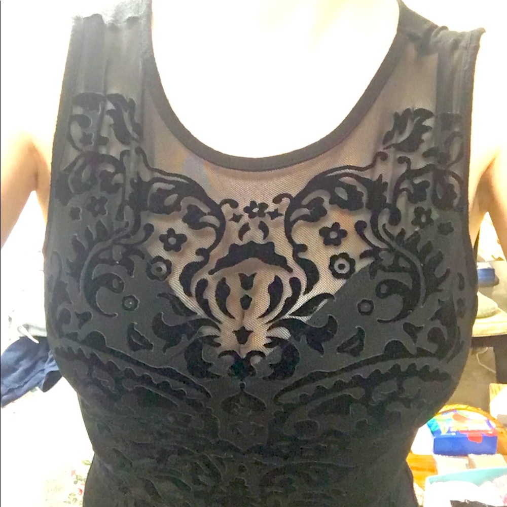 Black mesh leotard with velvet decal